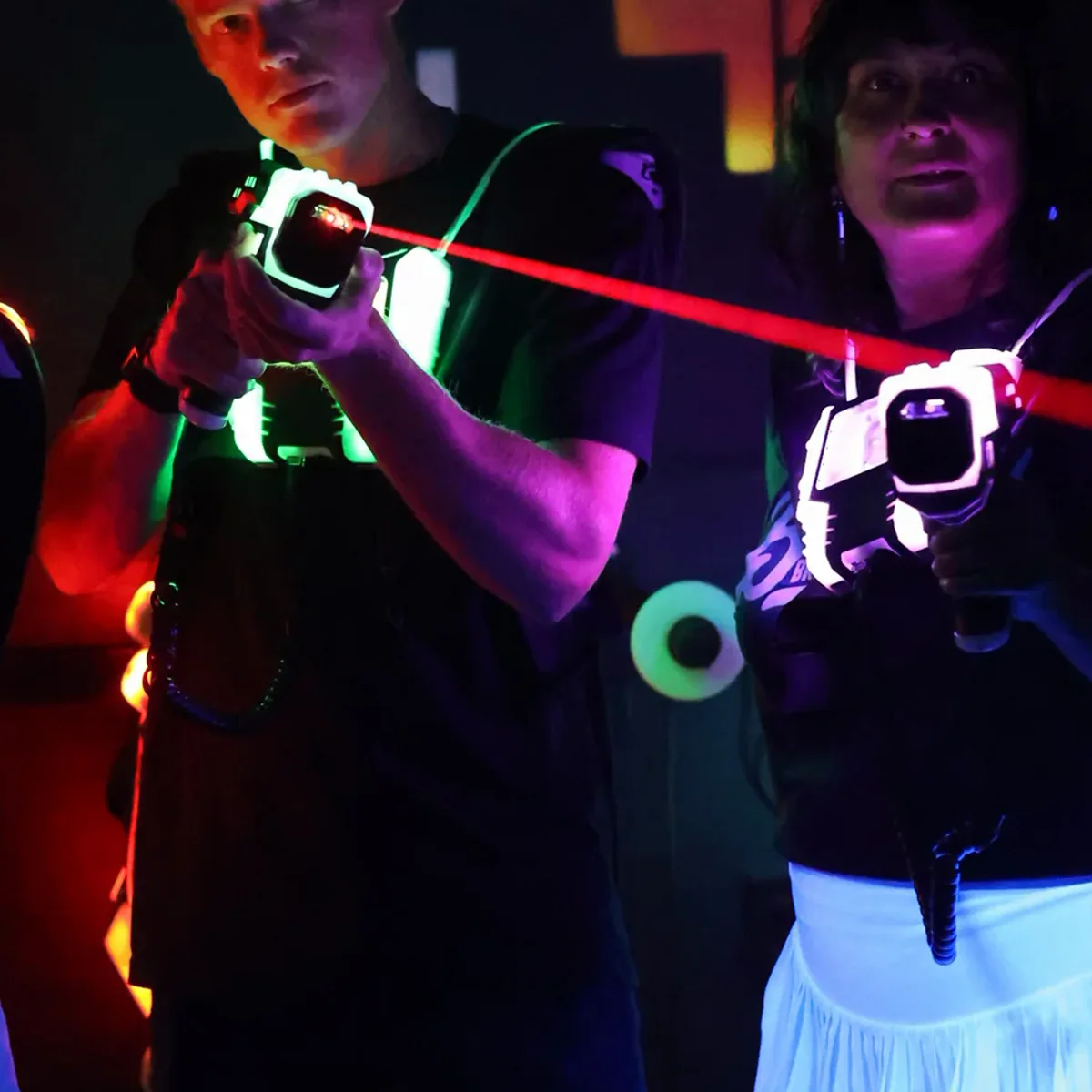 A player taking aim during a laser tag mission